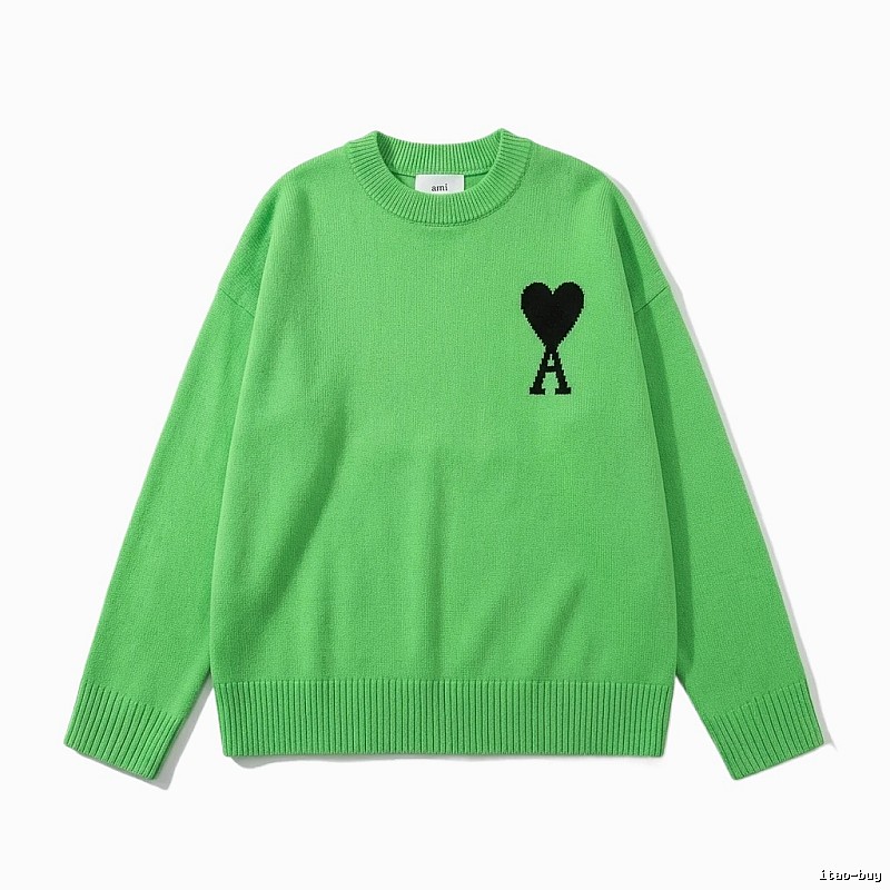 AMIRI's trendy and cool green sweater with a heart pattern.