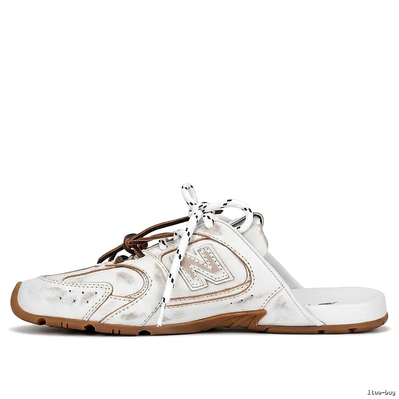 Miu Miu retro-style white slippers