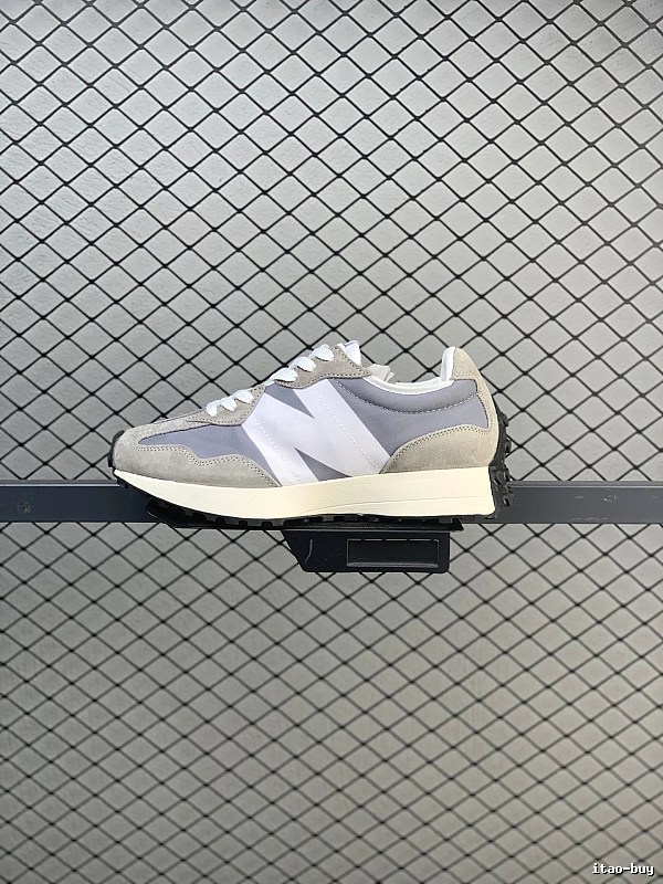 New Balance Pale Gray Retro Runners Highlighting Dynamic Sole Shape
